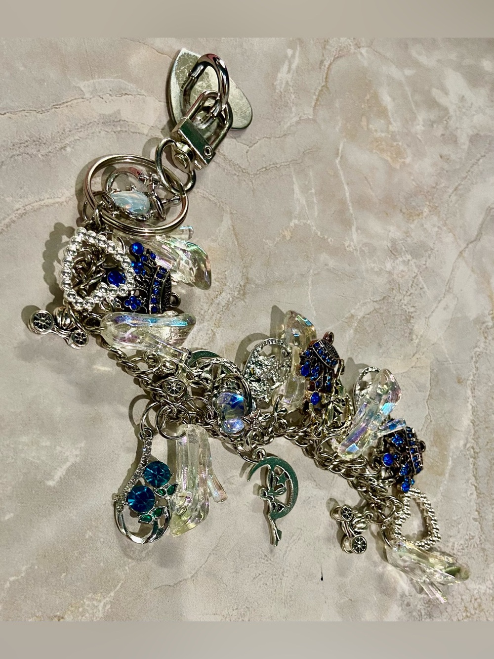Hand Crafted Silver Charm Keychain with Blue and Iridescent Accents